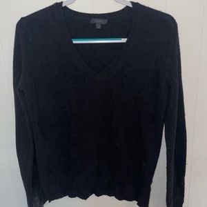 Black sweater with leather forearms